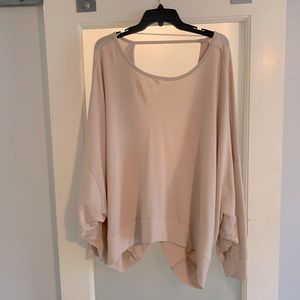 Boutique Light pink sweater with open back. Worn a couple of times